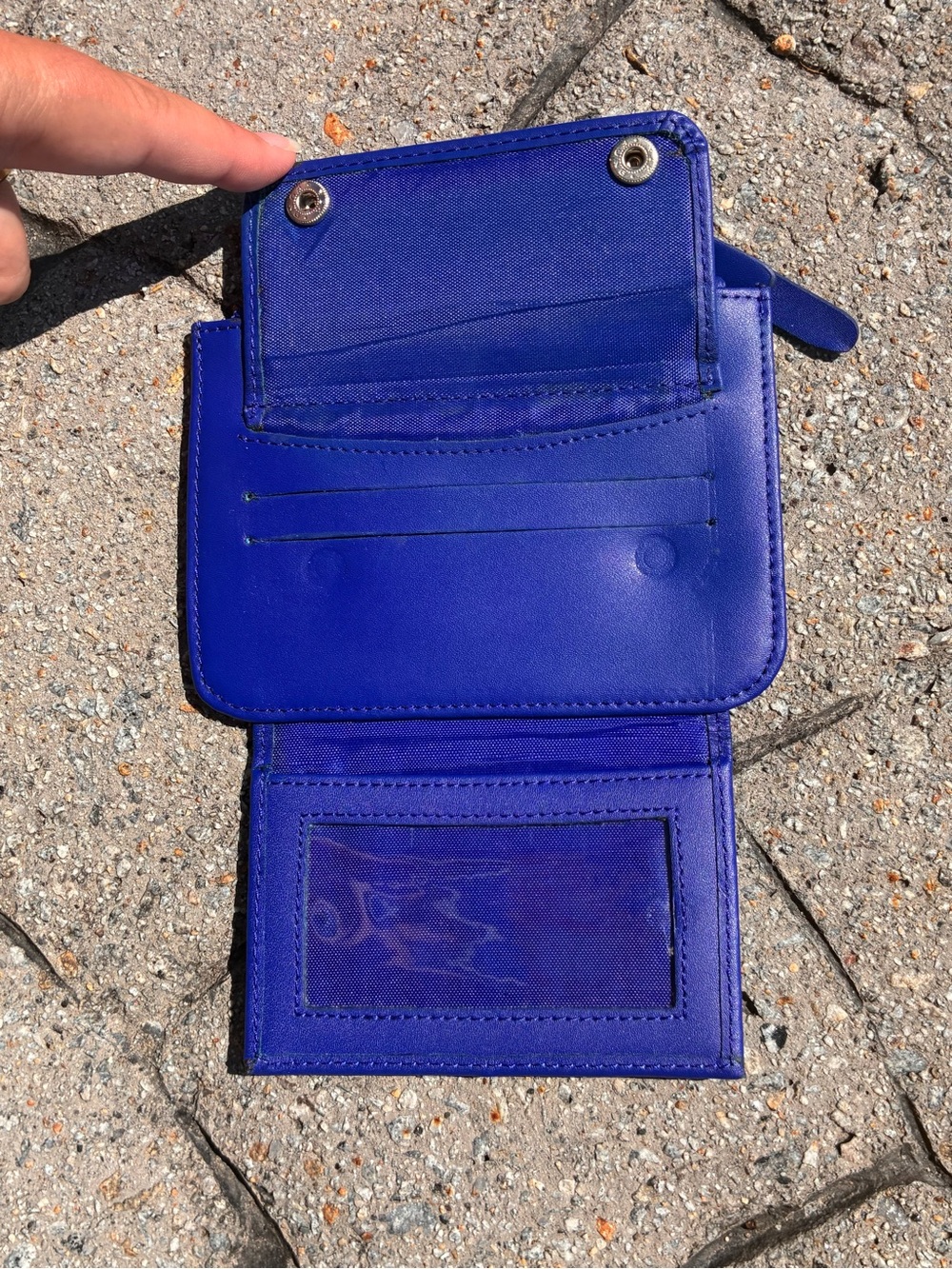 Bright royal blue genuine leather bifold wallet by Clava. Top zipper closure